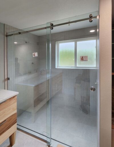 Barn door style glass shower door